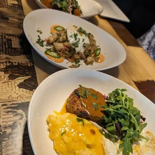 Top to bottom: Featured Smoked  red beets salad, Crab sticky rice, and Cheesy grits