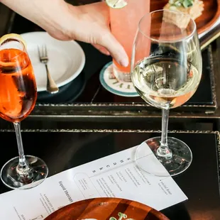 a plate of oysters and a glass of wine