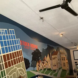 Taproom with mural.