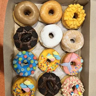 a variety of donuts in a box