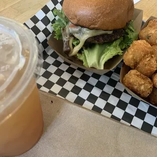 Ms. Fungi Fungi burger with tater tots.