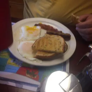 More of the All Menu - two eggs, toast, sausage link, sausage patty and bacon (with the homemade grape)