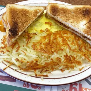 Omelette with hash browns and toast - huge portions!