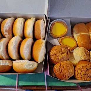 two boxes of doughnuts on a table