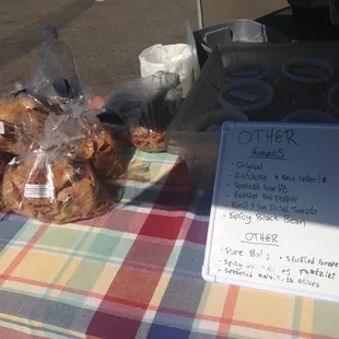 checkered table cloth and a sign