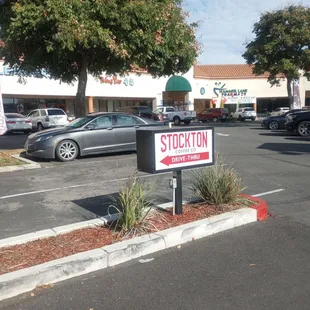 a parking lot with cars parked in it