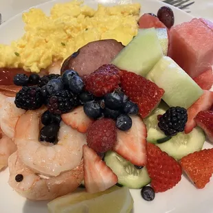 Mother's Day Brunch- Shrimp cocktail, assorted fruit, eggs, sausage.
