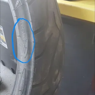 Evidence of tire direction with tread visible to use as reference when looking at other pic of wheel (tire included) on bike