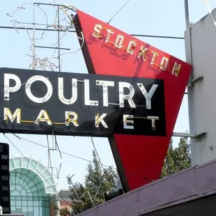 a sign for a poultry market