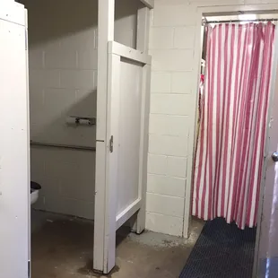 Shower area behind the curtain. They were always clean.