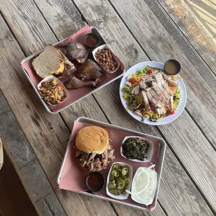 ig: @whatsviveating  | chicken breast, western beans, and dirty rice, chuck wagon salad with chicken, pulled pork sandwich