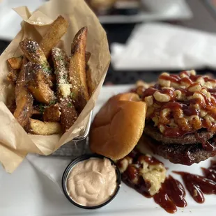 Dirty South burgers w/ parm truffle fries, Smoked paprika aioli.