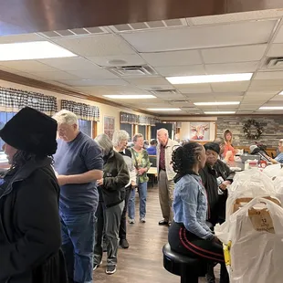 a large group of people standing in line
