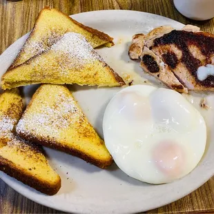 Perfectly cooked pork tenderloin, poached eggs and light and buttery French toast!