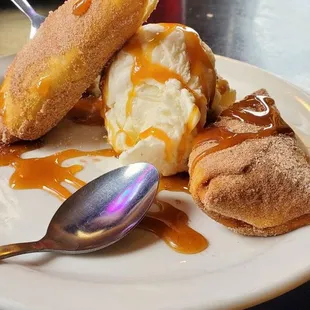 a plate of pastries and ice cream