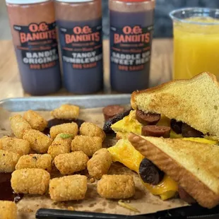 Breakfast sandwich and tots with O.G. Bandits BBQ. Yum!
