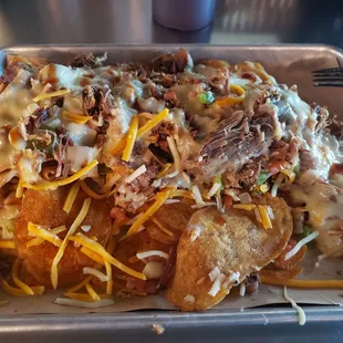 Cold nachos. Don't let the queso fool you like it did me. Nothing on this plate it warm.