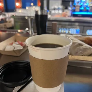 a cup of coffee on a table