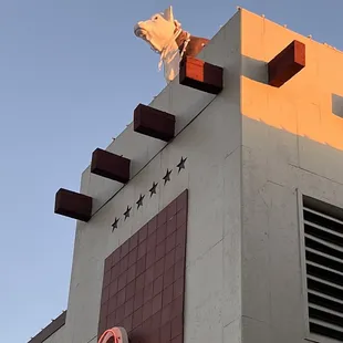 a horse on top of the building