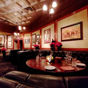 a dining room with tables and chairs