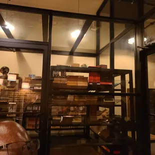 a man looking through a glass window