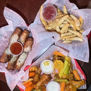 Chicken eggrolls, chicken wings, fries