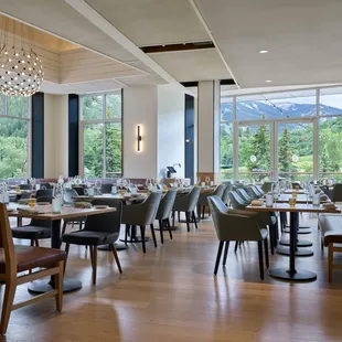 Stoke &amp; Rye's sunlit dining room opens on to a patio with stunning Beaver Creek views.