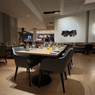 a dining room with tables and chairs