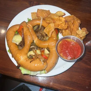 Veggie Pesto Pressed Sandwichin a pretzel