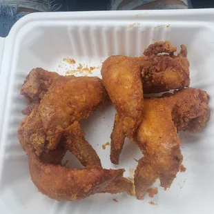 Delicious  nice and hot. Fried wings with season all and hot sauce. Don&apos;t forget the hot sauce!!