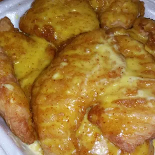 Soggy chicken tenders drowning in a sticky honey mustard and some kind of crud floating within it.  Can you say &quot;ew?&quot;
