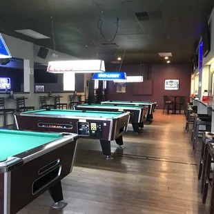 4 pool tables and 4 dart boards