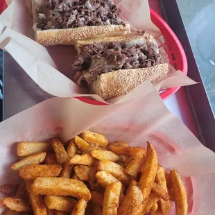 Secured the goods. Hefty delicious cheesesteaks and perfectly fried Cajun fries. Run, don&apos;t walk.