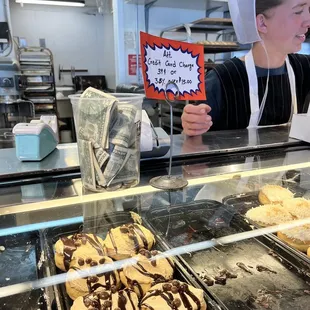 a woman behind the counter