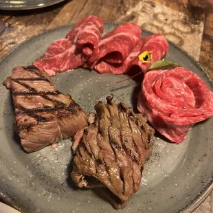 The Chef&apos;s Table: Boneless Galbi 4.5oz / Flat Iron 4.5oz / NY Strip 4.5oz / Marinated Galbi 4oz.