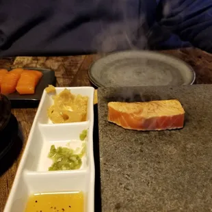 Salmon sashimi on rock