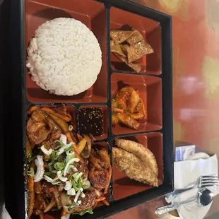 Lunch box special with spicy!  pork. SO GOOD! I&apos;m stuffed for cheap. This place is legit.