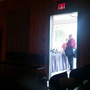 Overlooking the entrance where the check-in lady sits. You can order drinks and snacks here.