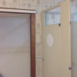 The 80&apos;s are calling...they want their preppy backwoods bathroom back!