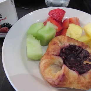 Sweet rolls, fruit and yogurt to top off your meal.