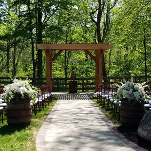 Outdoor rustic ceremony area.