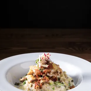 a plate of food on a wooden table