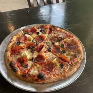 Personal 10&quot; with pepperoni, black olives, and artichokes.