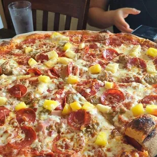 Meat pizza with pineapple