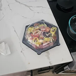 a plate of food on a counter top