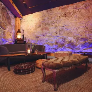 a living room with couches and a fireplace