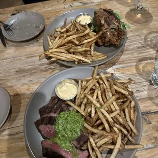 Steak frites and fried chicken sandwich