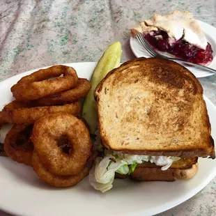 Chicken salad sandwich with onion rings and a slice of home made cherry pie. Awesome.