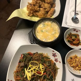 Fried chicken wings, pork tofu soup and japchae