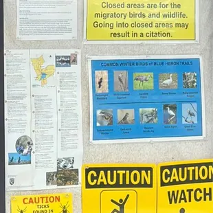 No dogs allowed. You wouldn't want to bring them anyways... there are ticks out there. Stay on the trails.